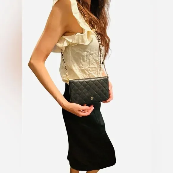 CHANEL Black and Gold Quilted Clutch - Picture 2 of 12